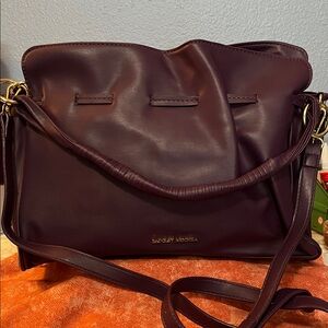 Badgley Mischka Plum Shoulder Bag with cross body strap and handle.